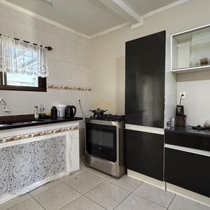 Casa, 3 dormitórios, 1 suíte, 1 vaga no bairro Igra Sul em Torres para Comprar