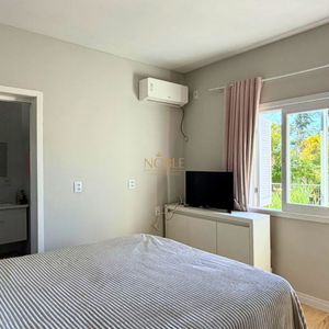 Casa com 125m², 4 dormitórios, 1 suíte, 2 vagas no bairro Vila São João em Torres para Comprar