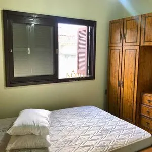 Casa, 2 dormitórios, 1 suíte, 1 vaga no bairro Itapeva Sul em Torres para Comprar