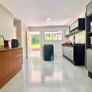 Casa com 127m², 2 dormitórios no bairro Vila São João em Torres para Comprar