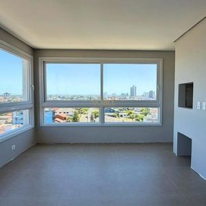 Apartamento com 70m², 2 dormitórios, 1 suíte, 1 vaga no Topazio em Torres para Comprar