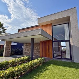 Casa de Condomínio com 237m², 4 dormitórios, 4 suítes, 2 vagas no Reserva das Águas em Torres para Comprar