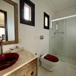 Casa com 180m², 4 dormitórios, 4 suítes, 2 vagas no bairro Praia da Cal em Torres para Comprar