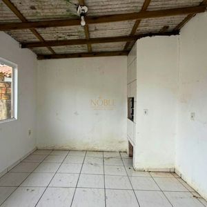 Casa com 74m², 2 dormitórios, 1 vaga no bairro Igra Sul em Torres para Comprar