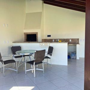 Casa com 240m², 4 dormitórios, 2 suítes, 2 vagas no bairro Praia Paraíso em Torres para Comprar