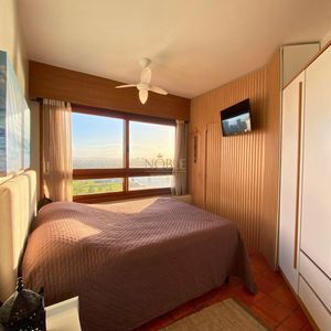 Apartamento com 102m², 2 dormitórios, 1 suíte, 1 vaga no La Tour em Torres para Comprar