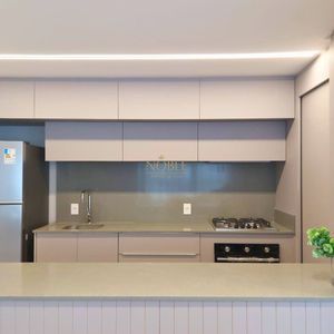 Apartamento com 108m², 3 dormitórios, 1 suíte, 2 vagas no Maui Residencial em Torres para Comprar