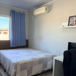 Casa com 125m², 4 dormitórios, 1 suíte, 2 vagas no bairro Vila São João em Torres para Comprar