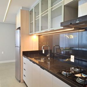 Apartamento com 77m², 2 dormitórios, 1 suíte, 2 vagas no Maui Residencial em Torres para Comprar