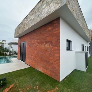 Casa de Condomínio com 220m², 3 dormitórios, 3 suítes, 2 vagas no Reserva das Águas em Torres para Comprar