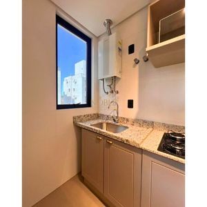 Apartamento com 64m², 2 dormitórios, 1 suíte, 1 vaga no Aston em Torres para Comprar