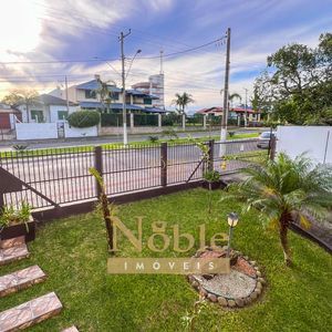 Apartamento com 110m², 2 dormitórios, 1 suíte, 1 vaga no Edificio Punta Balena em Torres para Comprar