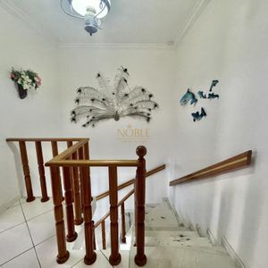 Casa com 500m², 7 dormitórios, 2 suítes, 2 vagas no bairro Centro em Torres para Comprar