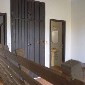 Casa com 260m², 5 dormitórios, 1 suíte, 2 vagas no bairro Praia Grande em Torres para Comprar