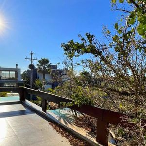 Casa de Condomínio com 338m², 4 dormitórios, 3 suítes, 2 vagas no Ocean Side em Torres para Comprar