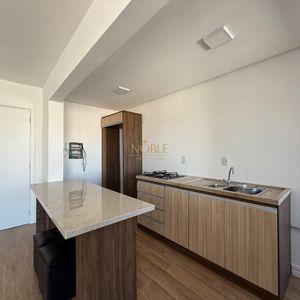 Apartamento com 80m², 2 dormitórios, 1 suíte, 1 vaga no Trade Center em Torres para Comprar