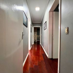 Casa com 184m², 3 dormitórios, 1 suíte, 2 vagas no bairro Igra Norte em Torres para Comprar