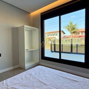 Casa com 180m², 3 dormitórios, 1 suíte, 2 vagas no bairro Praia da Cal em Torres para Comprar