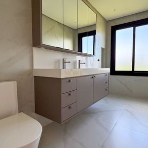 Casa de Condomínio com 237m², 4 dormitórios, 4 suítes, 2 vagas no Reserva das Águas em Torres para Comprar