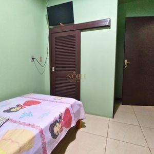 Casa, 6 dormitórios, 2 suítes, 3 vagas no bairro Getúlio Vargas em Torres para Comprar