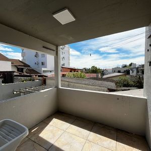 Sobrado com 350m², 5 dormitórios, 1 suíte, 4 vagas no bairro Centro em Torres para Comprar