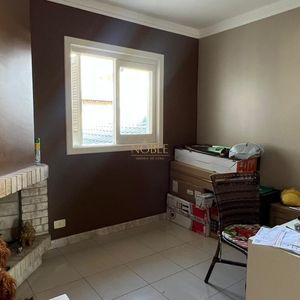 Sobrado com 290m², 4 dormitórios, 1 suíte, 2 vagas no bairro Igra Norte em Torres para Comprar