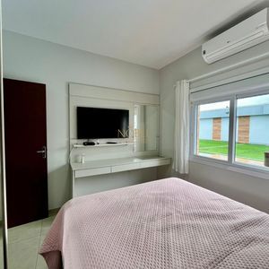 Casa com 670m², 5 dormitórios, 3 suítes, 3 vagas no bairro Bellatorres em Passo de Torres para Comprar