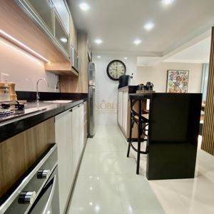 Apartamento com 97m², 3 dormitórios, 1 suíte, 2 vagas no Magnificus em Torres para Comprar