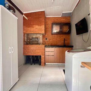 Casa com 127m², 2 dormitórios no bairro Vila São João em Torres para Comprar