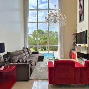 Casa com 600m², 4 dormitórios, 1 suíte, 4 vagas no bairro Igra Norte em Torres para Comprar