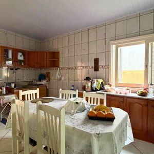 Casa com 101m², 2 dormitórios no bairro Igra Sul em Torres para Comprar