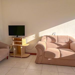 Apartamento com 100m², 2 dormitórios, 1 suíte, 1 vaga no Cayman em Torres para Comprar