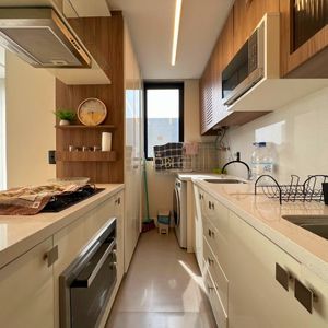 Apartamento com 64m², 2 dormitórios, 1 suíte, 1 vaga no Aston em Torres para Comprar