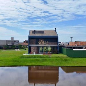 Casa de Condomínio com 417m², 4 dormitórios, 4 suítes, 2 vagas no Reserva das Águas em Torres para Comprar