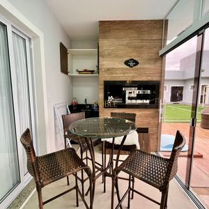 Casa com 670m², 5 dormitórios, 3 suítes, 3 vagas no bairro Bellatorres em Passo de Torres para Comprar