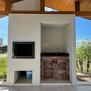 Casa com 95m², 2 dormitórios, 1 suíte, 2 vagas no bairro Praia Azul em Passo de Torres para Comprar