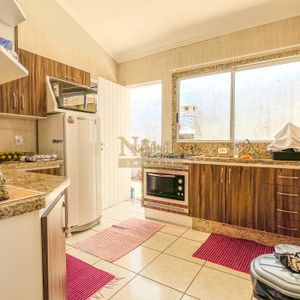 Casa, 2 dormitórios, 2 vagas no bairro Igra Norte em Torres para Comprar