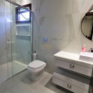 Casa de Condomínio com 301m², 4 dormitórios, 4 suítes, 2 vagas no Reserva das Águas em Torres para Comprar