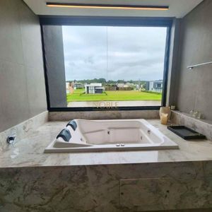 Casa de Condomínio com 390m², 4 dormitórios, 4 suítes, 2 vagas no Reserva das Águas em Torres para Comprar