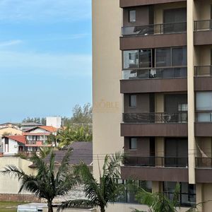 Apartamento com 73m², 2 dormitórios, 1 suíte, 1 vaga no Torre de Athena em Torres para Comprar