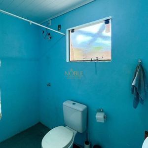 Casa com 80m², 2 dormitórios, 2 vagas no bairro Vila São João em Torres para Comprar