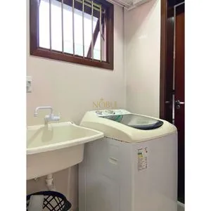 Casa com 148m², 3 dormitórios, 1 suíte, 2 vagas no bairro Morada das Palmeiras em Torres para Comprar