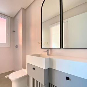 Apartamento com 112m², 3 dormitórios, 3 suítes, 2 vagas no La Vistara em Torres para Comprar