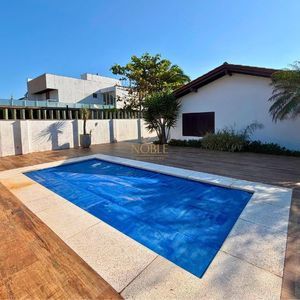 Casa, 3 dormitórios, 1 suíte, 2 vagas no bairro Praia Grande em Torres para Comprar