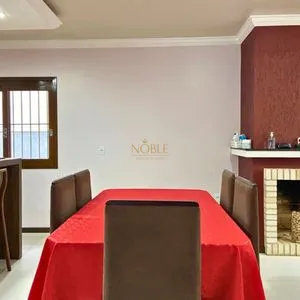 Casa com 148m², 3 dormitórios, 1 suíte, 2 vagas no bairro Morada das Palmeiras em Torres para Comprar
