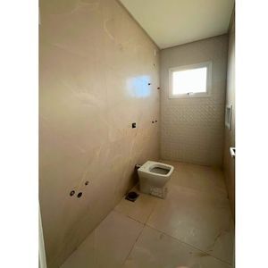 Casa de Condomínio com 170m², 4 dormitórios, 4 suítes, 2 vagas no Reserva das Águas em Torres para Comprar