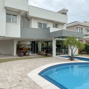 Casa de Condomínio, 4 dormitórios, 4 suítes, 2 vagas no Ocean Side em Torres para Comprar