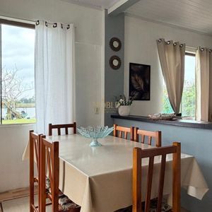 Casa com 300m², 4 dormitórios, 1 suíte no bairro Getúlio Vargas em Torres para Comprar