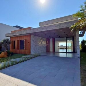 Casa com 335m², 4 dormitórios, 4 suítes, 2 vagas no Reserva das Águas em Torres para Comprar