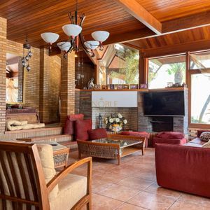 Casa, 4 dormitórios, 2 suítes, 3 vagas no bairro Praia Grande em Torres para Comprar